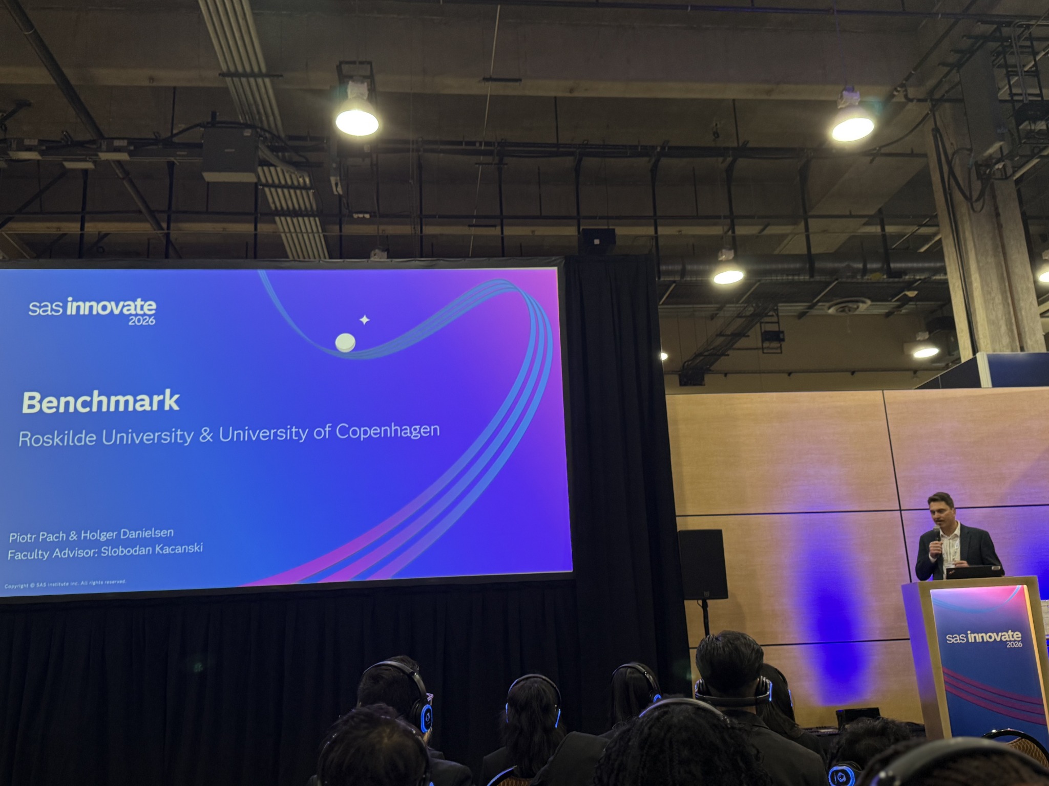 Piotr Pach presenting the Benchmark project at SAS Innovate 2026